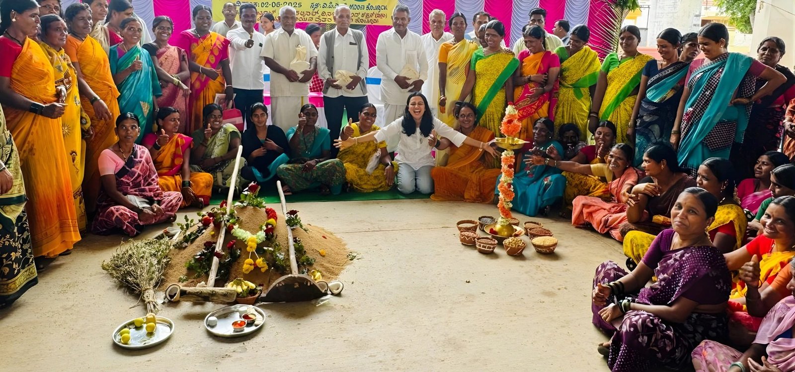 Health & Whole with a gathering of women farmers